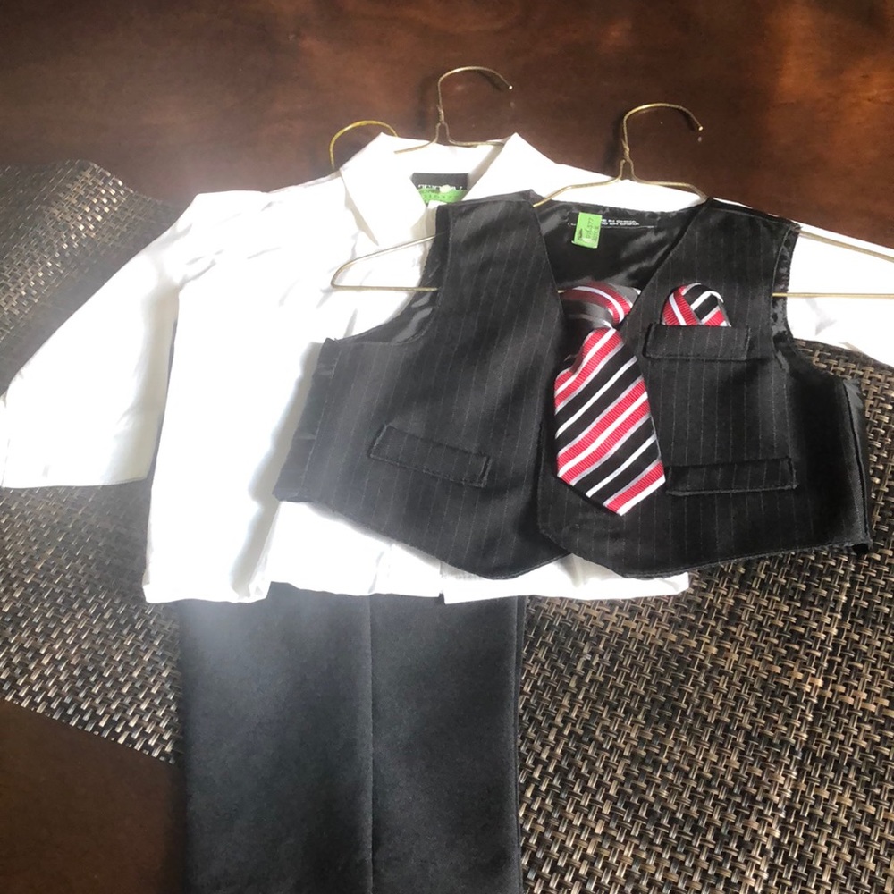 4 piece suit, worn once, dry cleaned